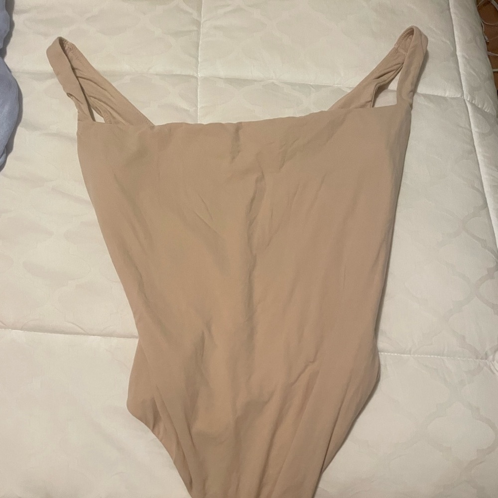 Skims tan body suit